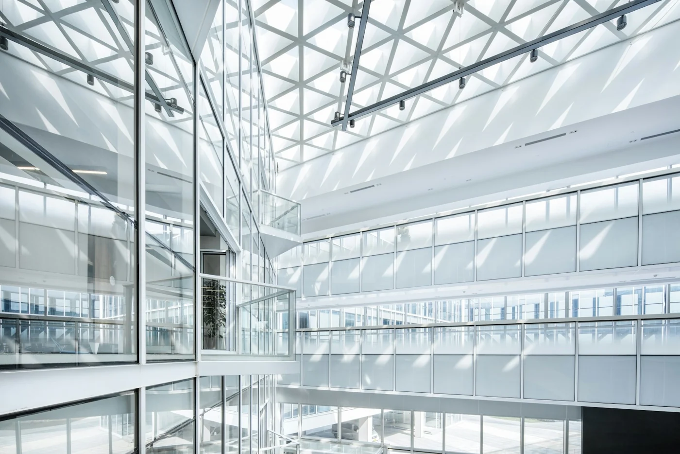 Daylight through the glass structure of a contemporary commercial building